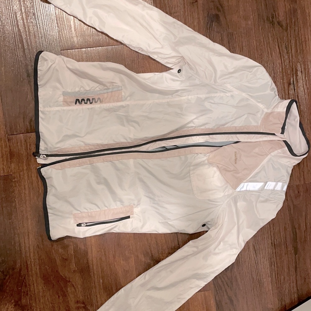White reflective Reebok running jacket